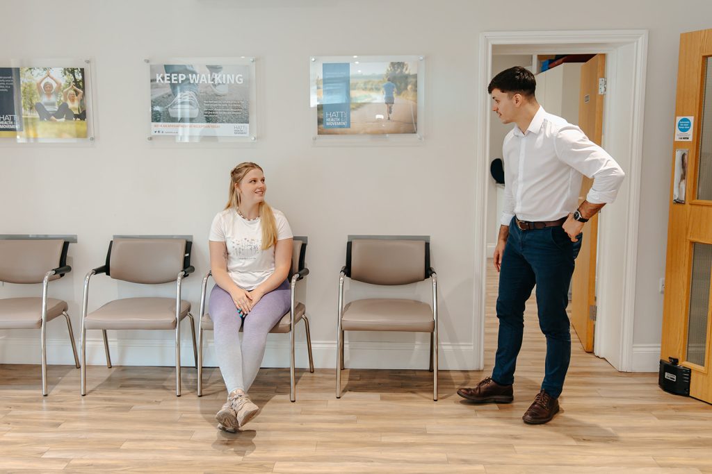 Physiotherapist Talking to patient